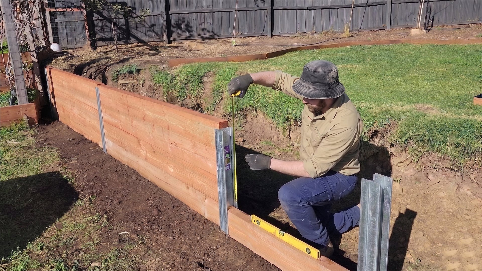Advanced Landscaping team member on a completed landscape